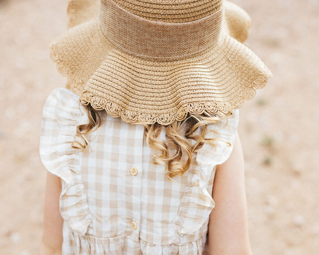 little girl in a sun hat