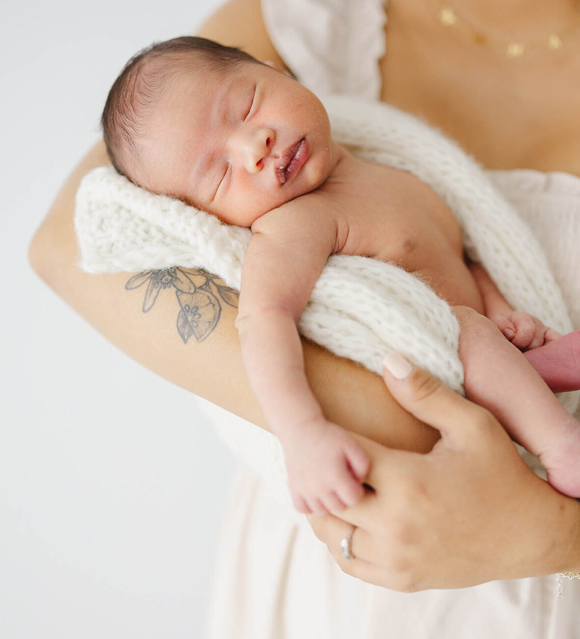 Fort collins newborn session mom holding baby