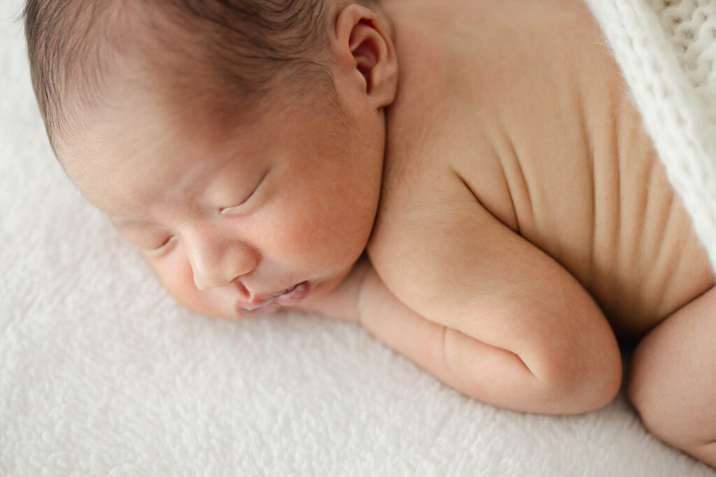 details of newborn baby skin wrinkles