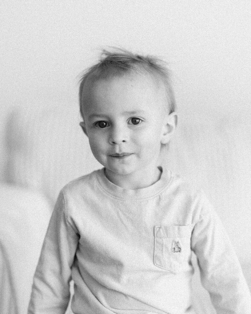 portrait of a little big brother looking at camera