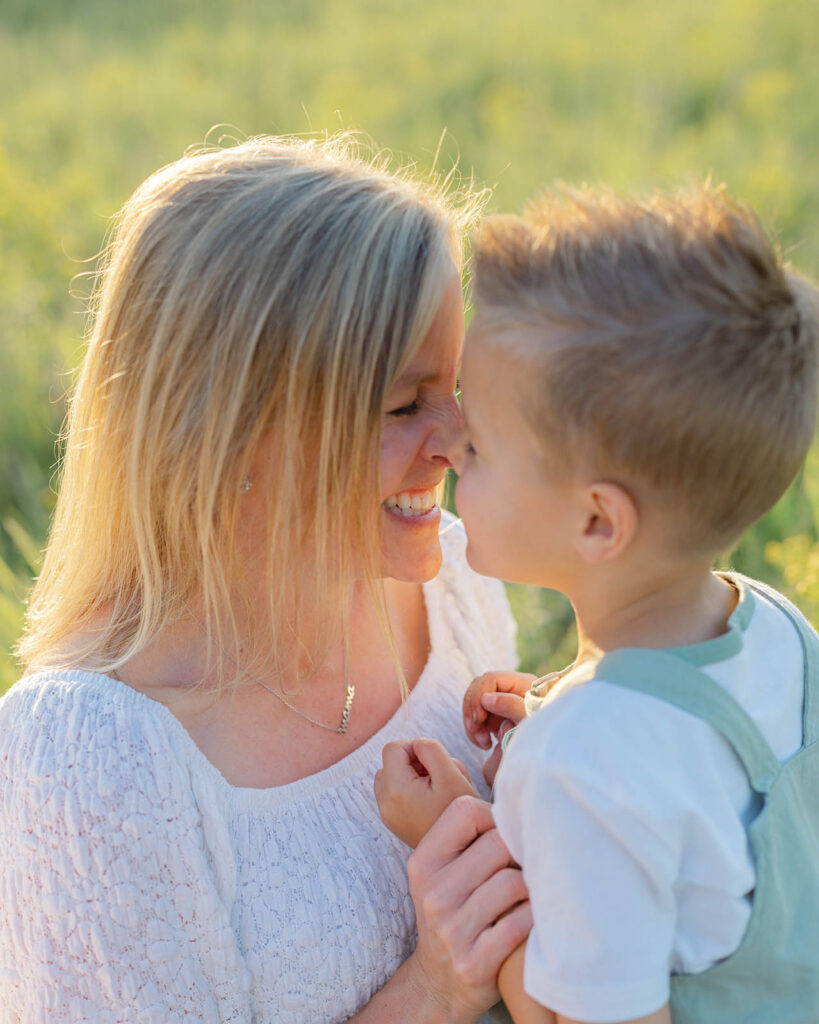 photo of mother and son touching noses