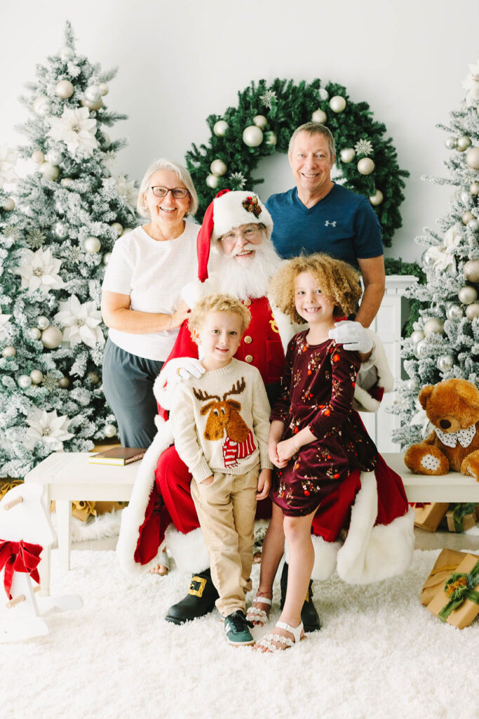 Family of four with Santa